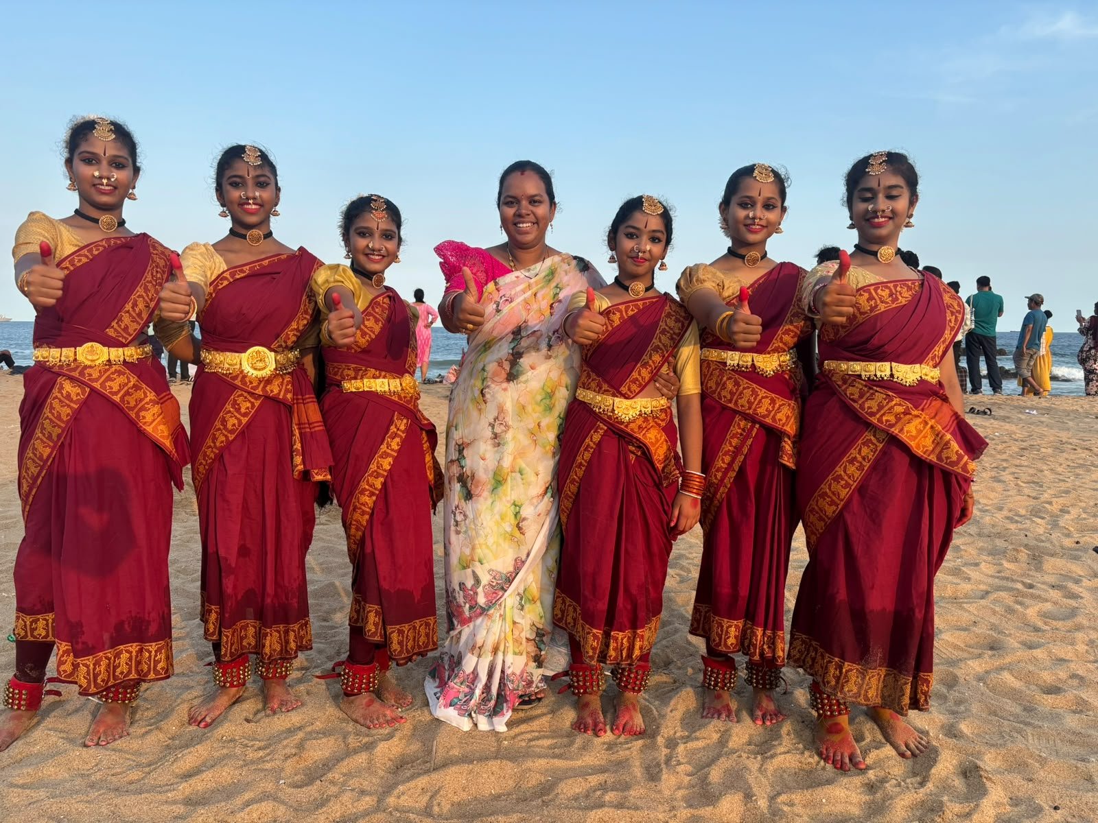 Guru Indrani Narendra Reddy and disciples celebrating by the shores of Visakhapatnam