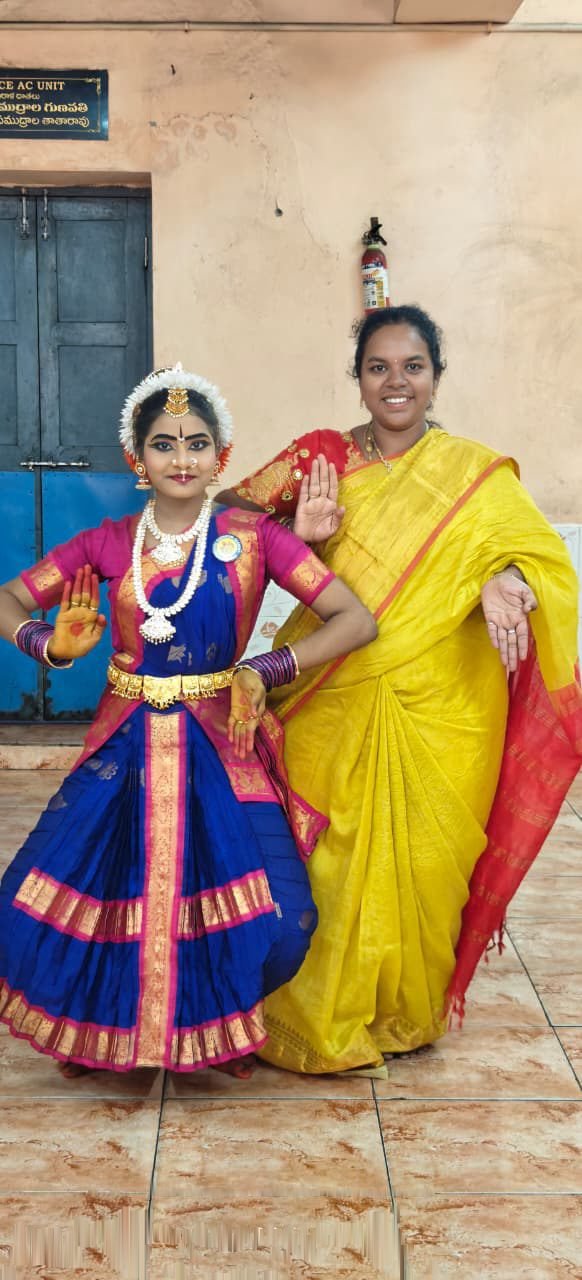 Graceful standing classical tribhangi posture by student dancer