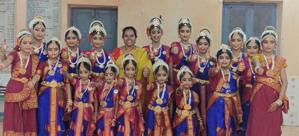 Guru L. Indrani Narendra Reddy with students of Natya Deepika Kuchipudi Academy in classical group dance formation